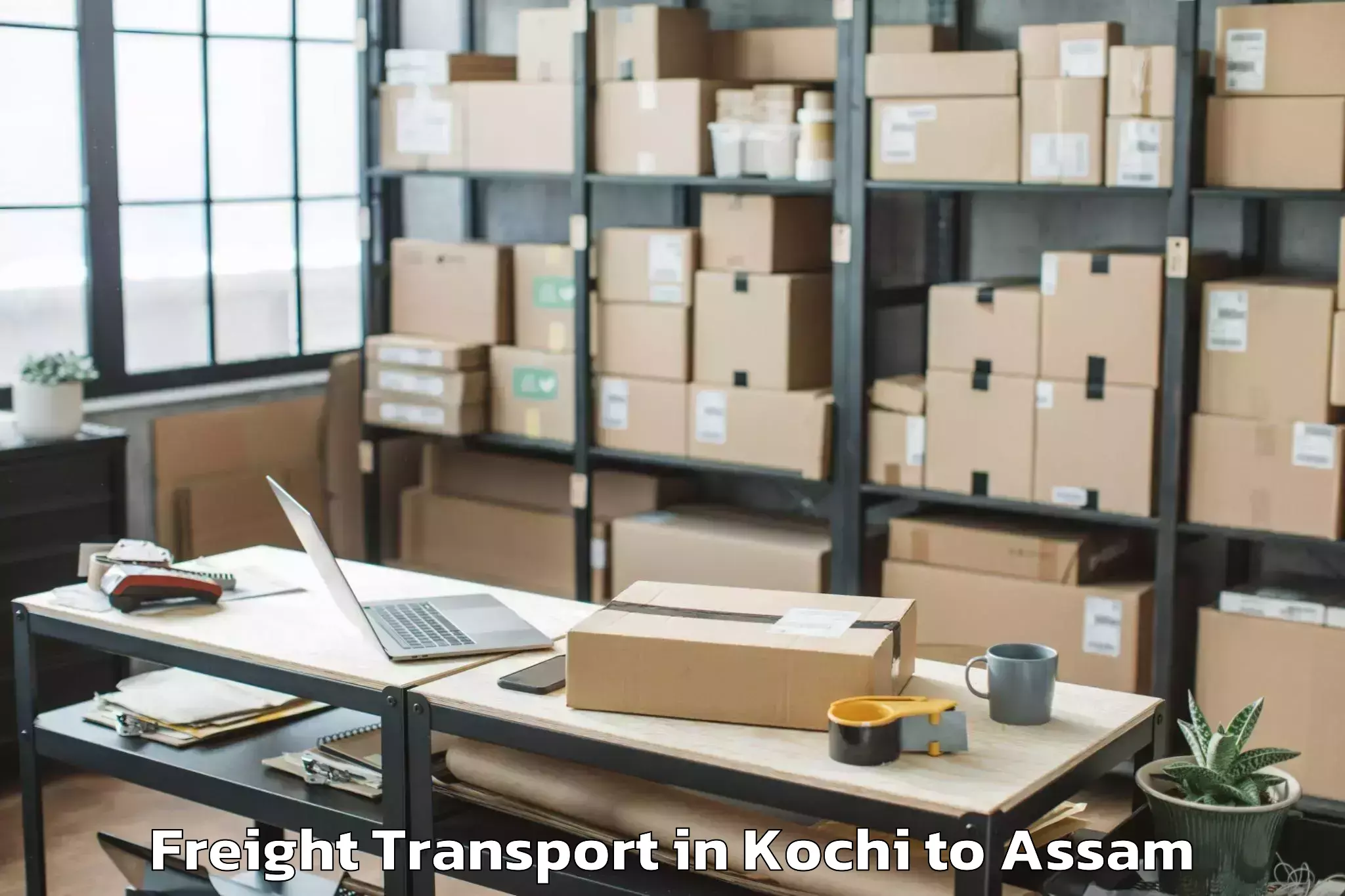 Trusted Kochi to Raha Gaon Freight Transport